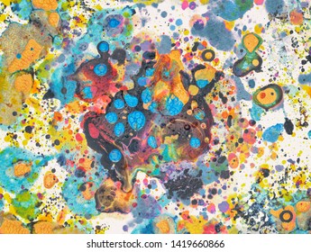Abstract splatter paint  background made with mixed acrylic paints on watercolour paper in pastel tones