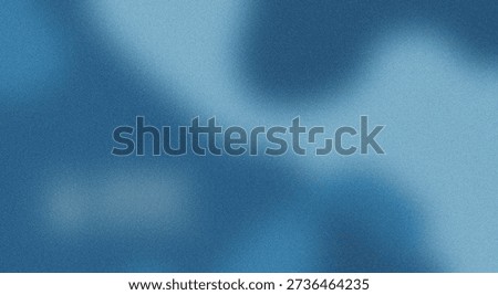 Abstract texture of a blue fabric with subtle irregular patterns and shading