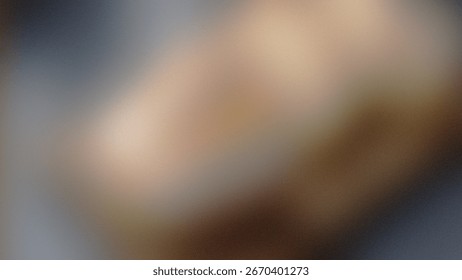 Abstract textured background with blurred light and dark shades suggesting a luminous surface