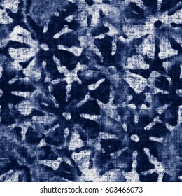 Abstract tie-dyed floral motif textured background. Seamless pattern.