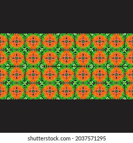 Abstract traditional batik flower motif in orange and green with black background