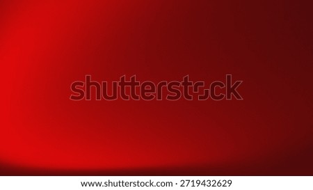 Abstract vibrant red gradient background with soft light leak and grainy film texture.