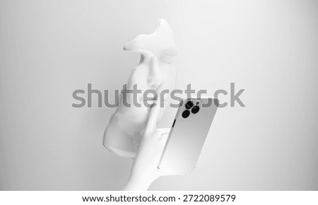 Abstract white human face interacting with a smartphone, representing fake news, social media deception, digital brainwashing, and the hidden dangers of modern technology influencing human behavior, 3d rendering.