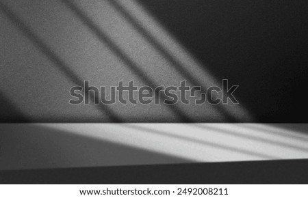 Abstract window background with light and shadow play on a textured wall surface, creating sleek diagonal lines. Perfect for product presentations, showcasing window shadows and striped wall patterns
