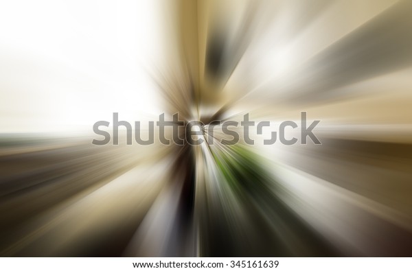 Abstract zoom\
background or fast blurred\
background.