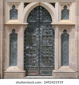  Add a touch of medieval elegance to your designs with this stunning 4K texture of a gothic-style doorway. The intricate wrought iron gates, adorned with ornate patterns and motifs, are set within a w