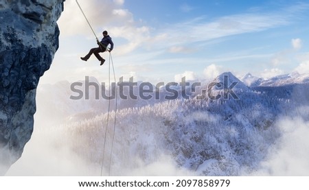 Adult adventurous man rappelling down a rocky cliff. Extreme adventure composite. 3d rendering mountain artwork. Aerial background landscape from British Columbia, Canada. [[stock_photo]] © 