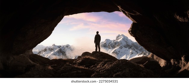 Adventurous Man Hiker standing in a Cave with rocky mountains in background. Adventure Composite. Sunset Sky. 3d Rendering rocks. Aerial Image of landscape from British Columbia. 3D Illustration - Powered by Shutterstock