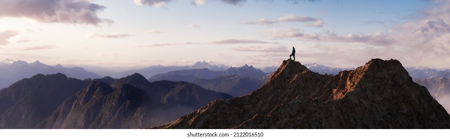 Adventurous Man Hiker Standing on top of a rocky mountain overlooking the dramatic landscape at sunset. 3d rendering peak. Background image from British Columbia, Canada. Adventure Concept Artwork - Powered by Shutterstock