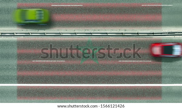 Aerial top down\
view of cars revealing flag of Morocco on the road. Traveling\
related conceptual 3D\
rendering