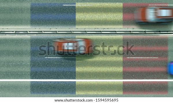 Aerial top down view of\
cars and flag of Romania on the road. Traveling related conceptual\
3D rendering