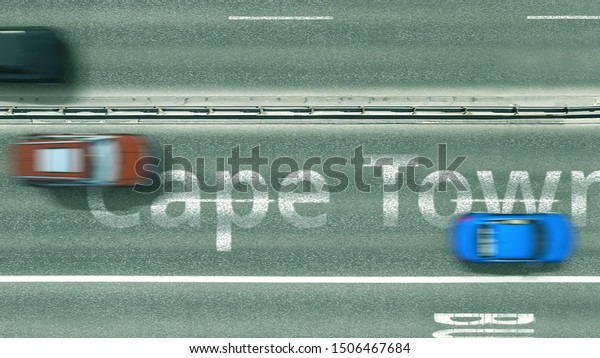 Aerial top-down view of the\
road. Cars reveal Cape town text. Travel to South africa 3D\
rendering