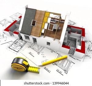 Aerial view of a house under construction, with blueprints and architect work tools - Powered by Shutterstock