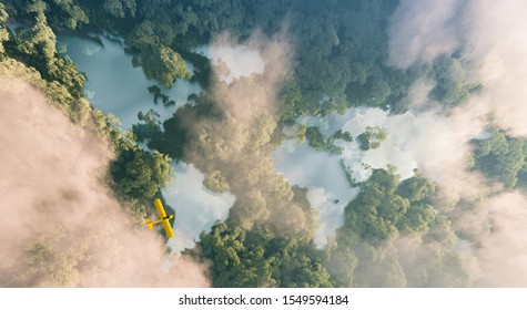 Aerial View Of Misty Rainforest Lakes In Shape Of World Continents In Dense Jungle Vegetation In Beautiful Late Evening Light. 3d Rendering