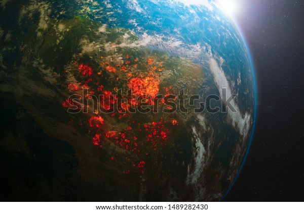 Aerial view from space of ecological\
disaster of fires in the Amazon, South\
America
