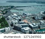 Aerial view of State Highway 1 and Wynyard Quarter, Westhaven Marina, and part of Auckland Harbour Bridge in Auckland, New Zealand, with digital oil-painting effect