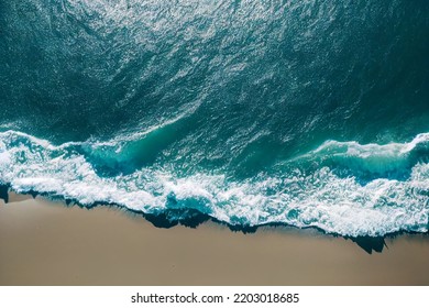 Aerial View Of Waves Crashing On A Shoreline 3d Illustration