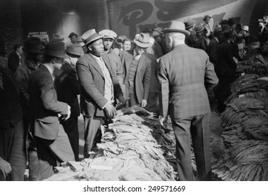 African American farmer negotiating at a tobacco Auction, Durham, North Carolina, Nov. 1939. Photo by Marion Wolcott.