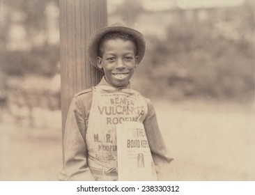African American newsie,'Roland, eleven year old newsboy', Newark, New Jersey, photograph by Lewis Wickes Hine, August 1, 1924.