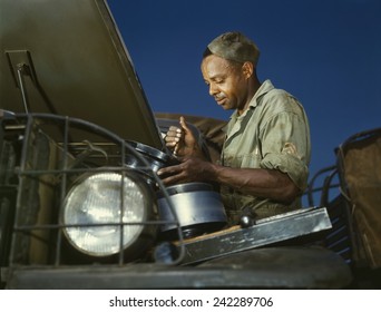 African American Soldier, A Truck Driver And Mechanic, Was One Of Thousands Of Blacks Relegated To Support Roles In The Segregated U.S. Armed Forces During World War II. Fort Knox, Kentucky, 1942.