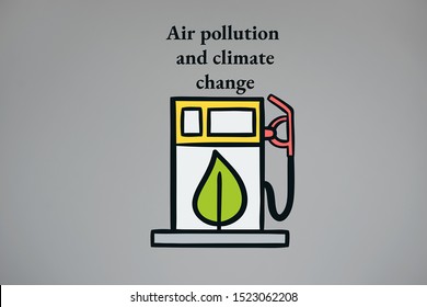 Air Pollution And Climate Change In Black Text Above A Graphic Design Illustration Of A Fossil Fuel Gasoline Pump Icon On An Isolated Grey Background.