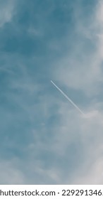 Airplane in sky through thecloud