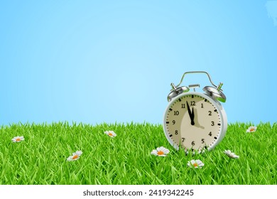 Alarm clock on a meadow in the grass. Daylight saving transitional change of season. 3d rendering - Powered by Shutterstock