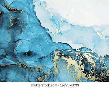 Alcohol Abstract. Indigo, White And Gold Stains. Blue Ice Stains. Water Ink Splatter. Aquamarine Drops Aquarelle Paint. Alcohol Ink Spots. Clouds Macro.