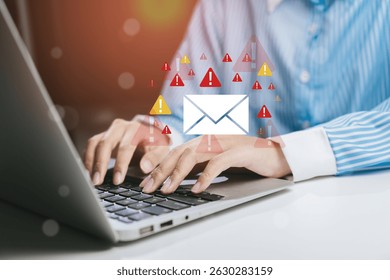 Alert Notifications and Email Communication Concept with Hands Typing on Laptop in Modern Workspace
