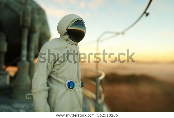 alone astronaut on alien planet. Martian on\
metal base. Future concept. 3d\
rendering.