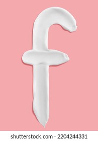 Alphabet Letter F Handwritten, White Cream Moisturiser Texture Smear Stroke Isolated On Pink Background
