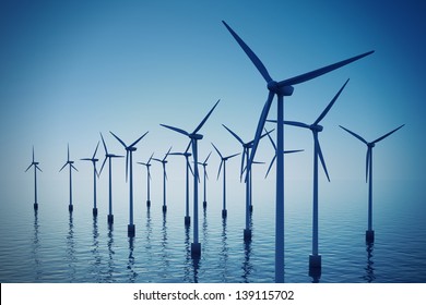 Alternative Energy- Shot Of Floating Wind Turbine Farm During Foggy Day.