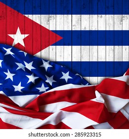 America Flag Of Fabric  And Cuba Flag Of Wood