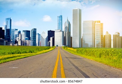 American Country Road With City On The Horizon