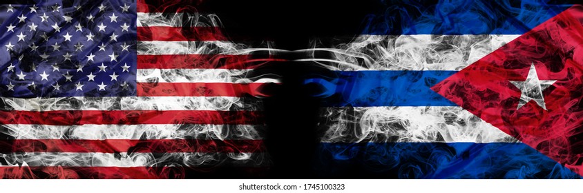 American flag and Cuban flag in smoke on black. Concept of world conflict and war. America VS Cuba business metaphor. Dollar Pesos exchange currency, international commercial tension. 3D illustration.