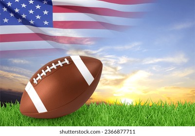 American football ball on a grass against the sunset with USA flag. 3d-rendering - Powered by Shutterstock