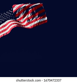 American USA flag flying at nighttime, overlay on cobalt deep blue background, copy space - Powered by Shutterstock