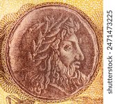 Ancient coin with Philip II of Macedon (382-336 BC). King of Macedon, a state in northern ancient Greece. Portrait from Greece 1000 Drachmai 1950 Banknote. 