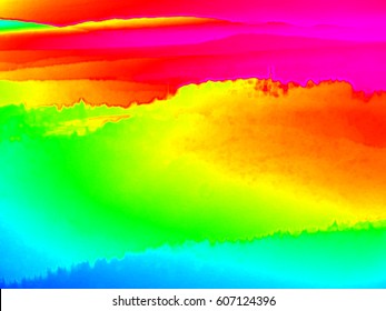 Animal View. Infrared Scan Of Hilly Landscape, Pine Forest With Colorful Fog, Hot Sunny Sky Above. Grunge Background In Amazing Thermography Colors.