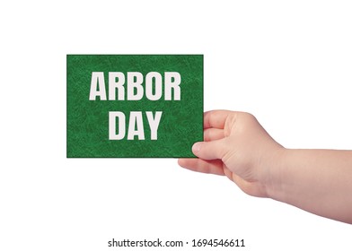 Arbor day. Inscription in hand. - Powered by Shutterstock