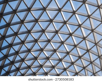 Architectural glass structure with a geometric triangular pattern, Steel glass roof wall construction transparent window with support system