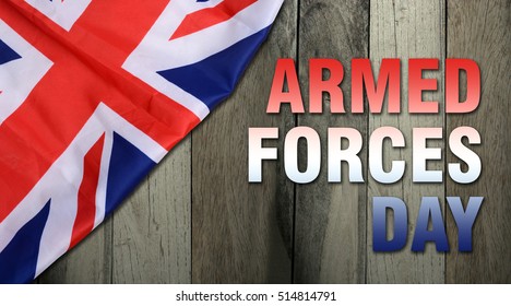 Armed Forces Day On Wooden Background - Flag Of The United Kingdom UK