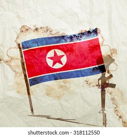 Army Gun And Helmet And North Korea Flag On Watercolor Grunge Paper Background