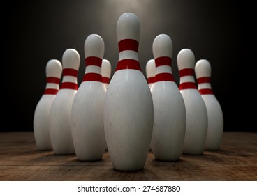 An Arrangement Of White And Red Used Vintage Bowling Pins Resting On A Wooden Bowling Alley Surface On A Dark Background