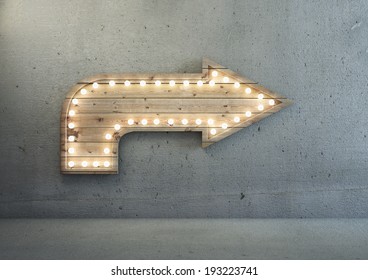 Arrow With Lights In Concrete Interior