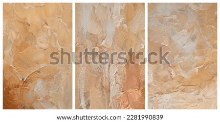 Art modern oil and acrylic smear blot canvas painting. Interior abstract triptych wall. Gold, bronze, beige and white color stain brushstroke texture background.