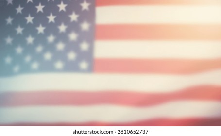 An artistic and soft focus blurred view of the American flag with muted colors and a dreamlike quality ideal for patriotic backgrounds or conceptual themes.