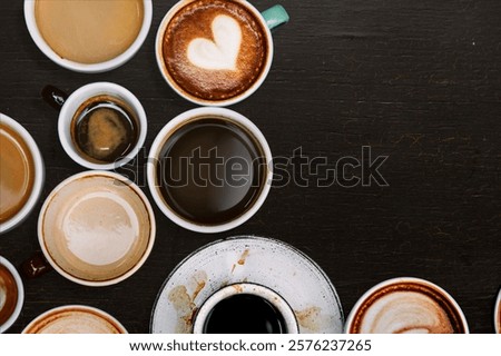 Assorted coffee cups on a dark table. Coffee with latte art, espresso, and black coffee. variety showcasing different styles. Cup with coffee background image.