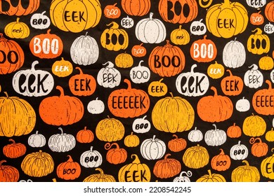Assorted Halloween pumpkins as a background, wallpaper, backdrop