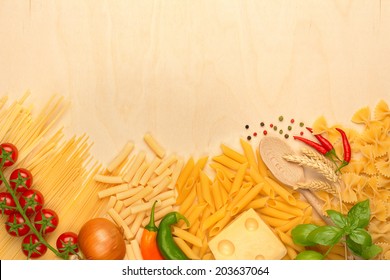 assortment of pasta, emmental and fresh vegetables - Powered by Shutterstock